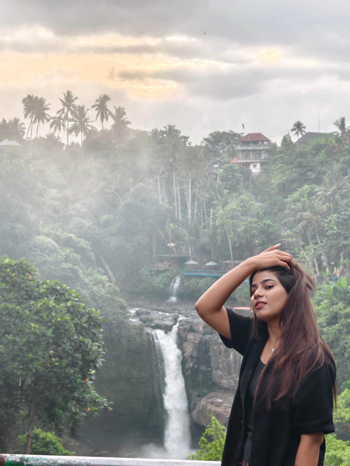 A traveler at Tegenungan waterfall near Ubud